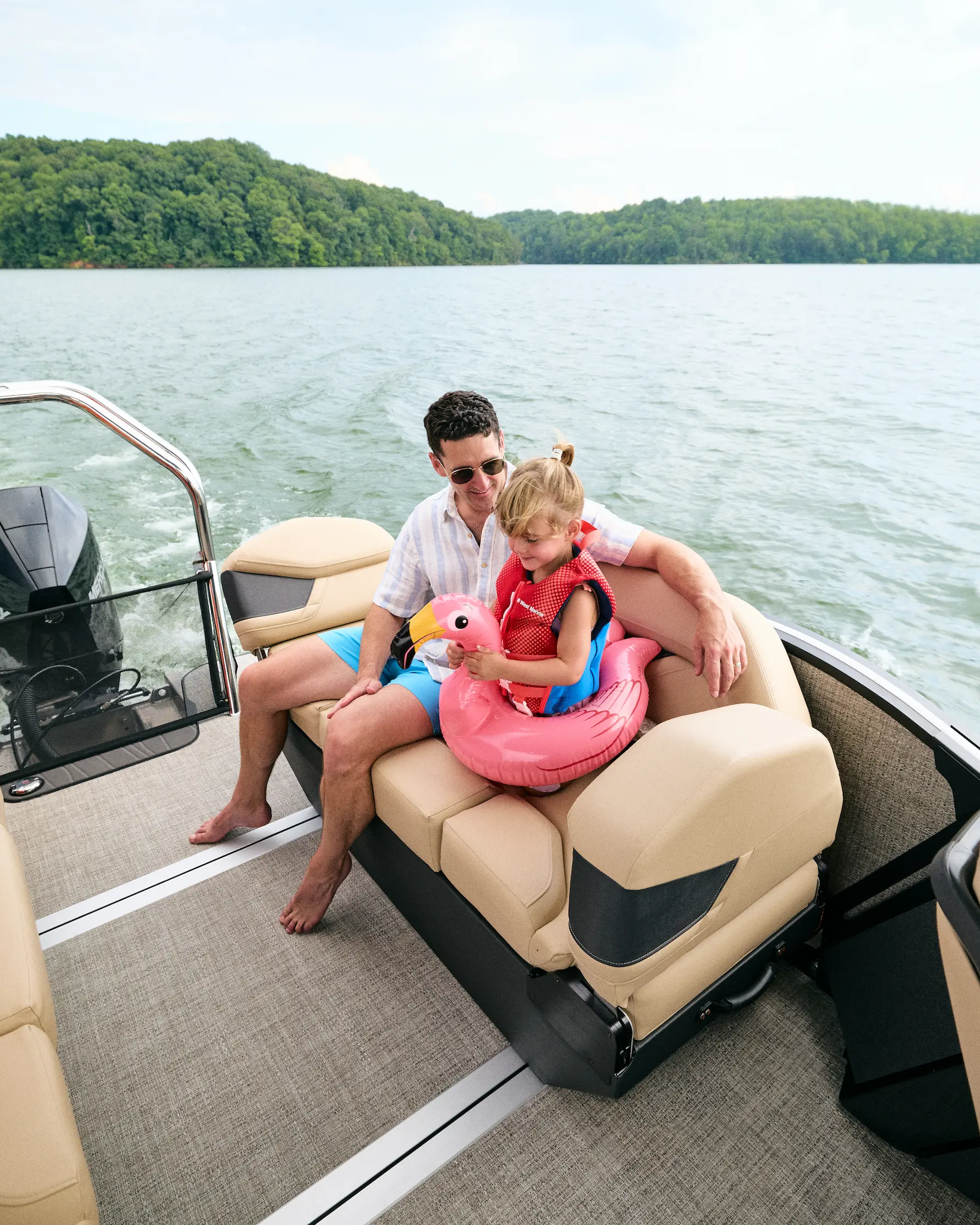 A family with young children enjoying a day aboard the Flamingo ROVE