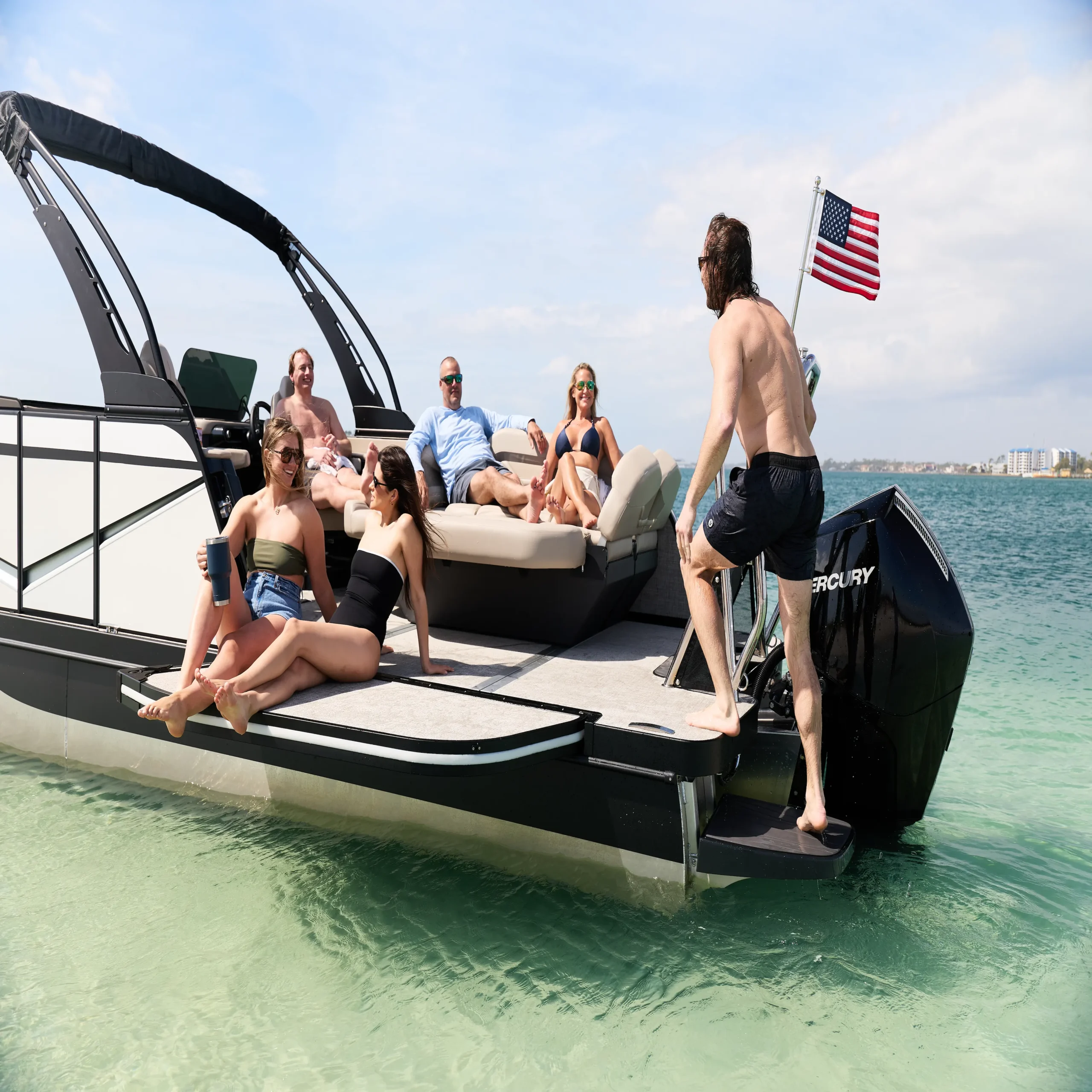 A family gathered at the stern of a Flamingo ROVE